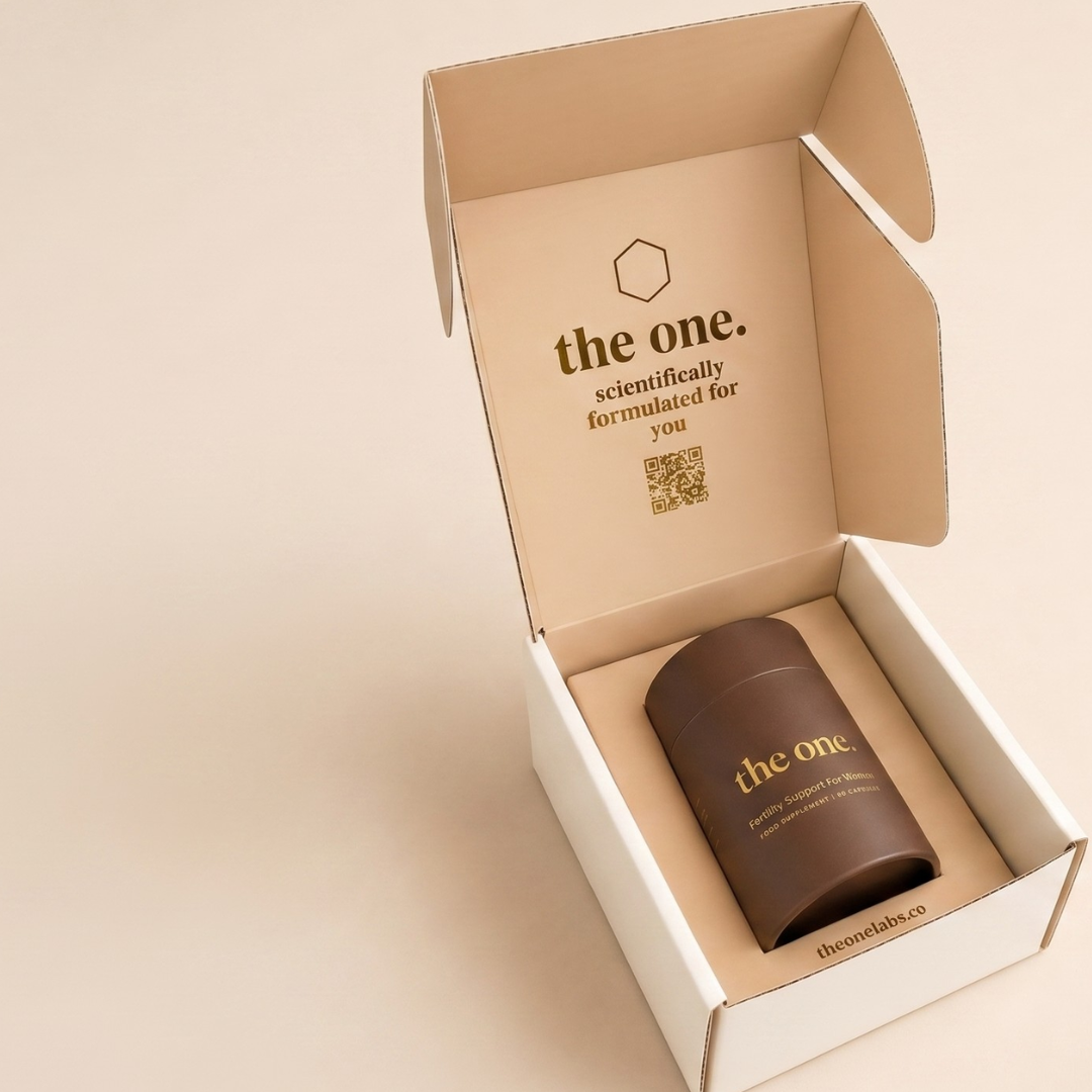The One fertility supplement packaging and capsules